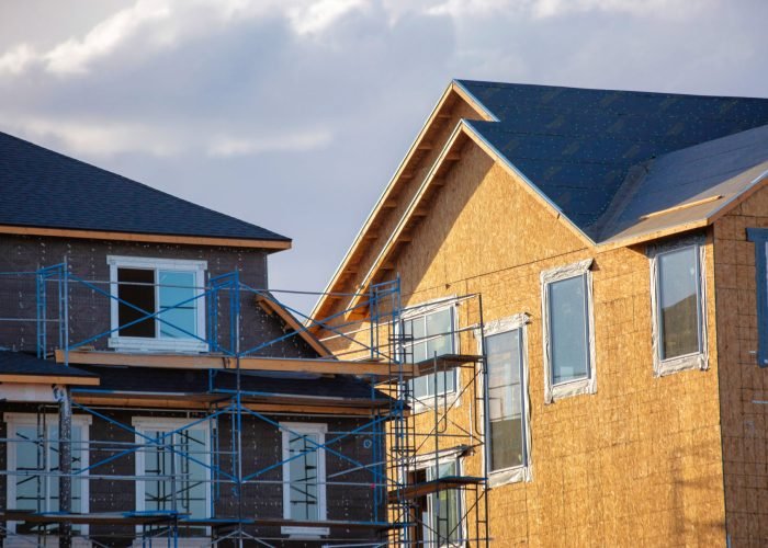 A closeup shot of houses on a cloudy day